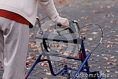 Woman with walker Stock Photo