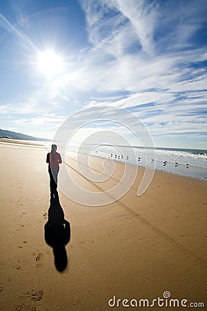 Woman walking alone Stock Photo