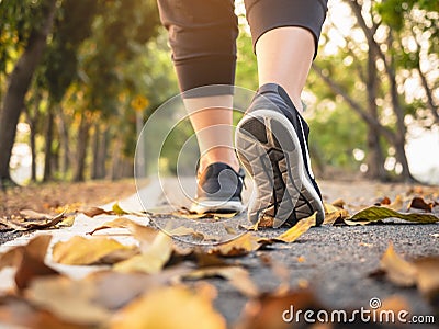 Woman walking in Park outdoor Workout Trail walkway Exercise Healthy lifestyle Stock Photo