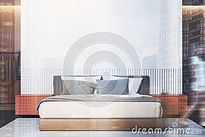 Woman walking in white and orange bedroom Stock Photo