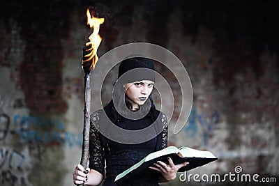 Warlock with a torch Stock Photo