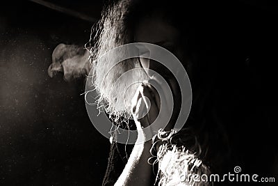 Woman warming hands Stock Photo