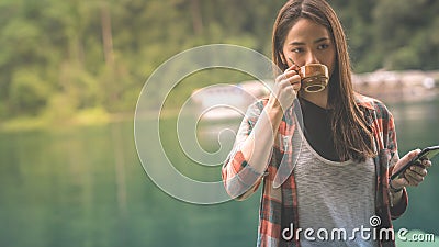 A woman was drinking coffee in the morning Editorial Stock Photo