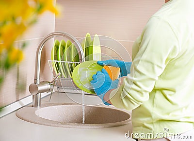 Woman Washing Dishes Stock Photo