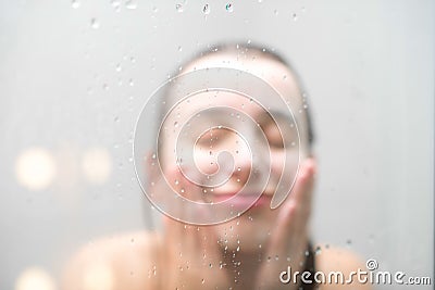 Woman washing face Stock Photo