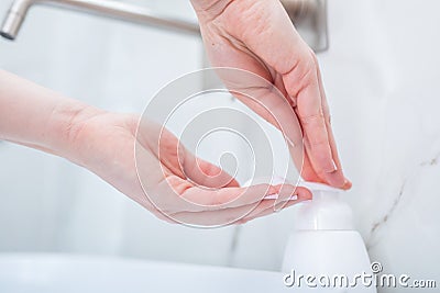 Woman washing hands with foam soap. Hygiene, preventing coronavirus Stock Photo