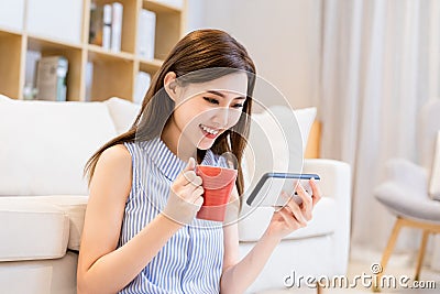 Woman watch video with smartphone Stock Photo
