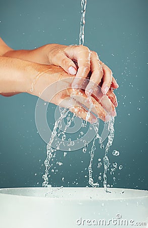 Woman, water and washing hand zoom on studio background, hygiene and skincare with beauty. Health, wellness and Stock Photo