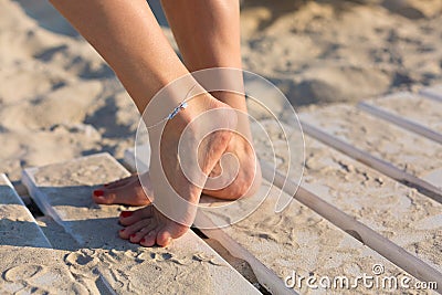 Woman wearing an anklet Stock Photo