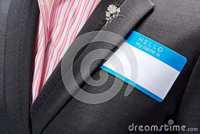 Woman wearing business suit and silver pin Stock Photo