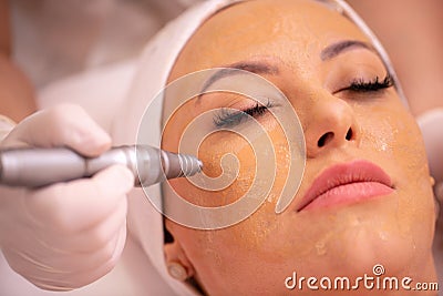 Woman wearing a cosmetics facial beauty mask in close up Stock Photo