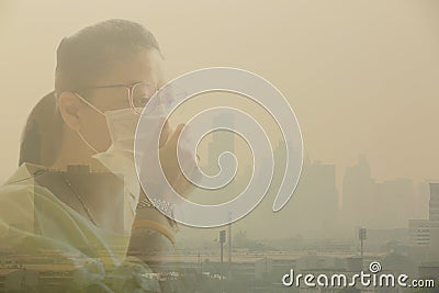 Woman wearing face mask because of air pollution in the Bangkok Stock Photo