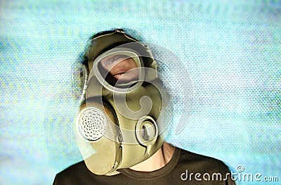Woman wearing gas mask and headphones Stock Photo