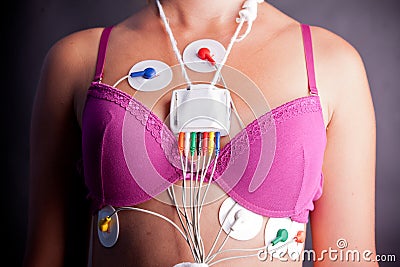 Woman wearing a Holter Heart Monitor Stock Photo