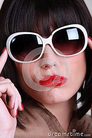 Woman wearing oversized sunglasses Stock Photo