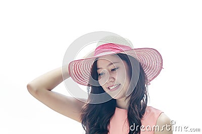 Woman wearing pink straw hat with expression of happy Stock Photo
