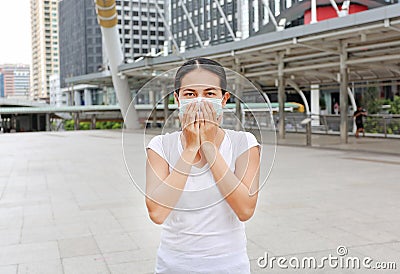 Woman wearing protective mask to protect pollution and the flu Stock Photo