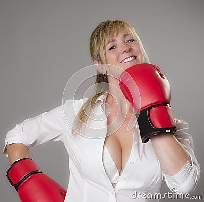 Woman wearing red boxing gloves Stock Photo