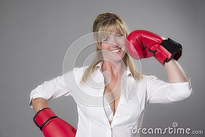 Woman wearing red boxing gloves Stock Photo
