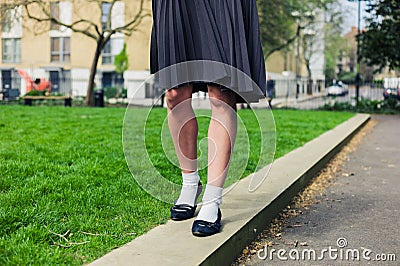 Woman Wearing A Skirt Walking In Park Stock Photo - Image: 53062139