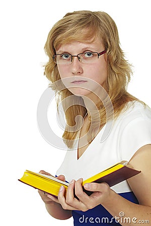 Woman wearing spectacles reads book Stock Photo