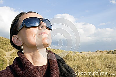 Woman wearing sun glasses Stock Photo