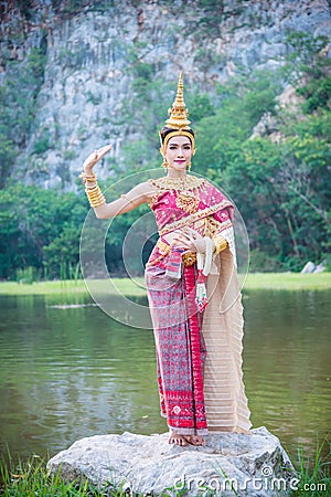 Woman wearing Thai ancient traditional costume Stock Photo