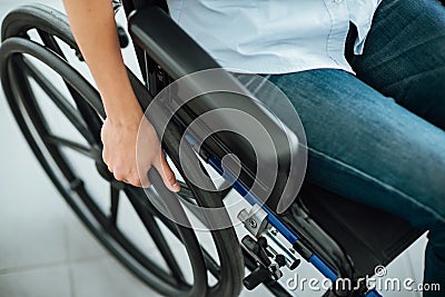 Woman in wheelchair Stock Photo