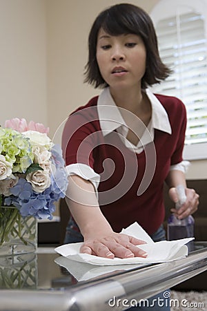 Woman Whisking With Napkin Stock Photo