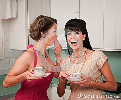 Woman Whispers Joke Stock Photo