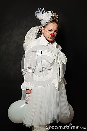 Woman white clown on blackboard backgrund Stock Photo