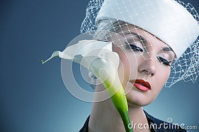 Woman with white kala flower Stock Photo