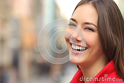 Woman white smile with a perfect teeth in the street Stock Photo