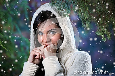 Woman in winter forest Stock Photo