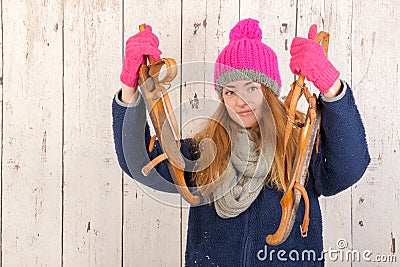 Woman in winter with old Dutch wooden ice skates Stock Photo