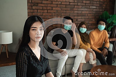 Woman withdraw herself on social interaction Stock Photo