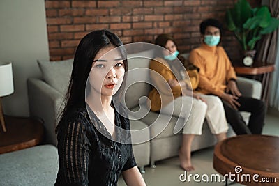 Woman withdraw herself on social interaction Stock Photo