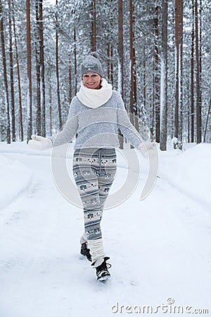 Woman in cosy wintery clothing outdoors Stock Photo