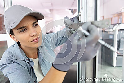 woman worker in metal workshop Stock Photo