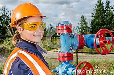 Woman worker in the oilfield Stock Photo