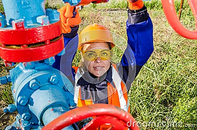 Woman worker in the oilfield Stock Photo