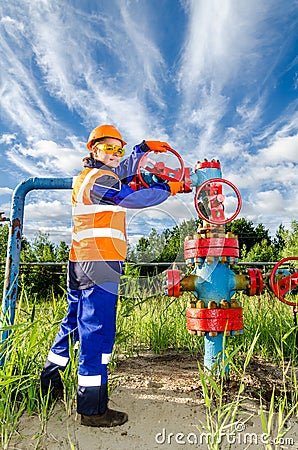 Woman worker in the oilfield Stock Photo