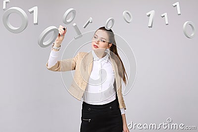 Woman working with binary code, concept of digital technology. Stock Photo