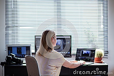 woman working in a home office - social media influence, blogger, vlogger, freedom Stock Photo