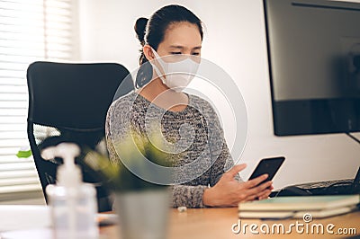 Woman working at home. Office worker on quarantine. Home working to avoid virus disease. Freelancer or remote worker concept Stock Photo