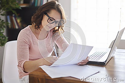 Woman working at home Stock Photo