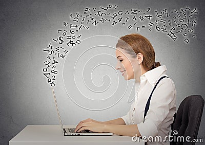 Woman working on laptop computer Stock Photo