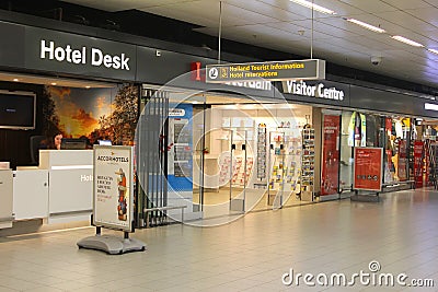 Hotel desk tourist information Holland Schiphol Plaza, Schiphol Airport, Netherlands Editorial Stock Photo