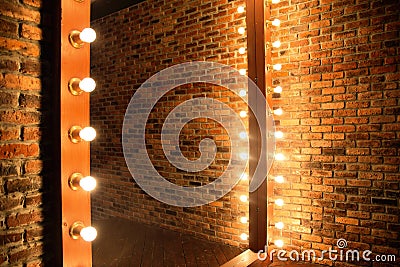 Woman's makeup place with mirror and bulbs Stock Photo