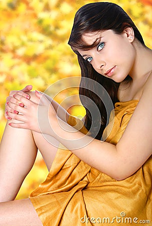 Woman in yellow day spa. Stock Photo